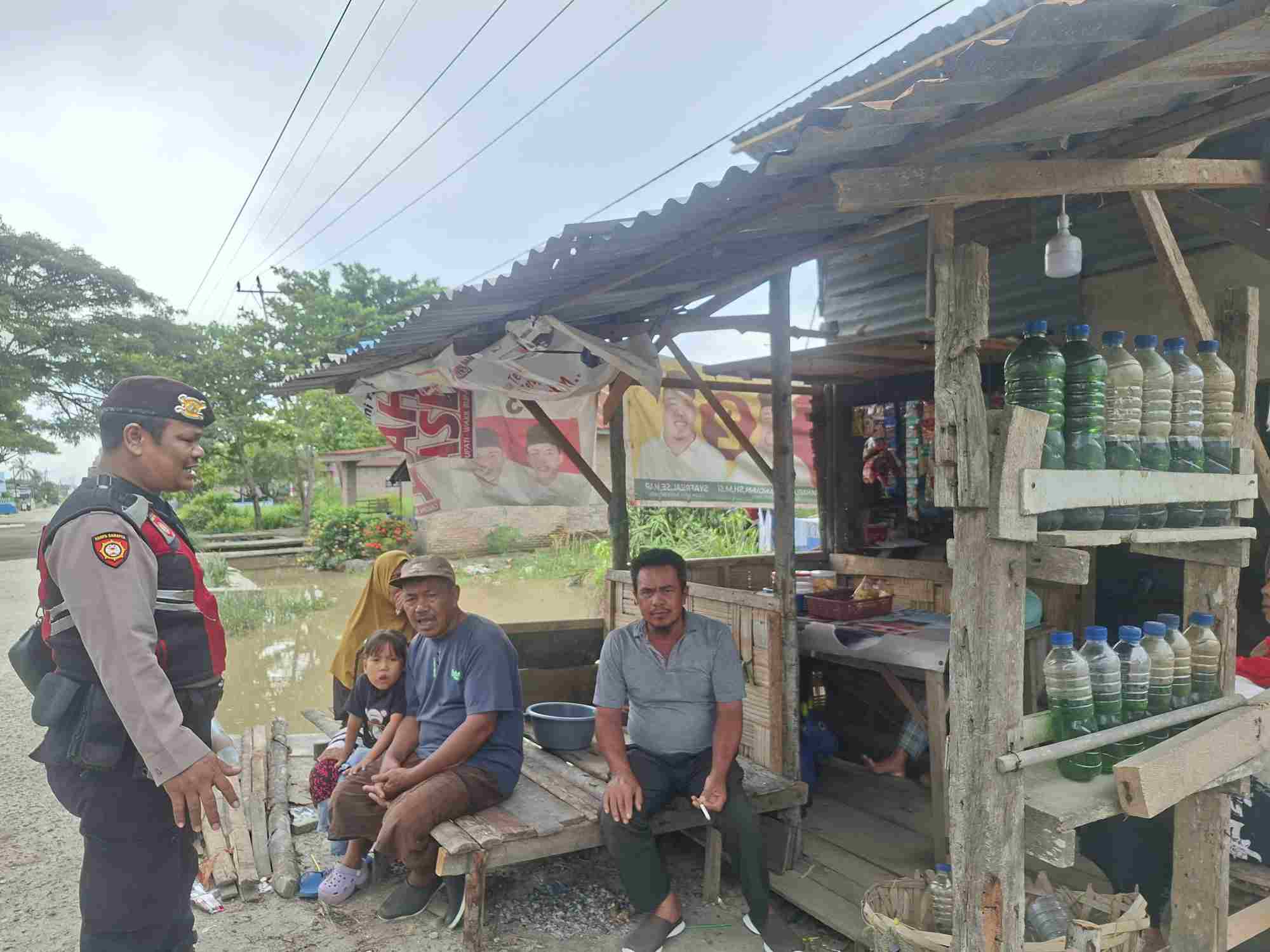 Ps. Kanit Samapta Polsek Medang Deras Laksanakan Sambang Warga di Desa Sidomulio, Sosialisasi Cegah Kejahatan dan Hoaks   